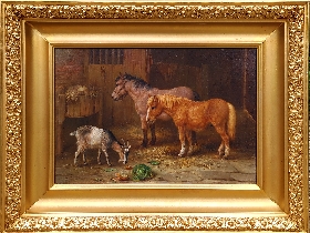 Ponies and Goats in a Stable