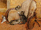 Kittens Playing Around a Saddle