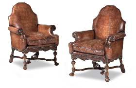 A Pair of Leather Upholstered Armchairs